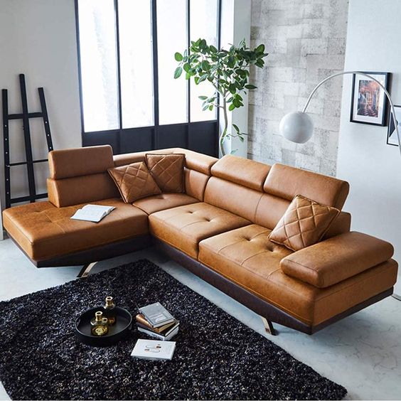 9d34b4040b2d46cb35149522c9939a2d Mueble marrón de cuero con cojines marrones en sala de estilo minimalista y moderno